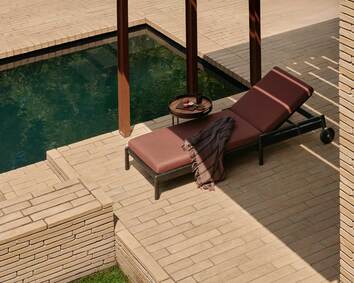 Ethnicraft-Jack-Outdoor-Lounger-Black-Teak-Burgundy-Lifestyle