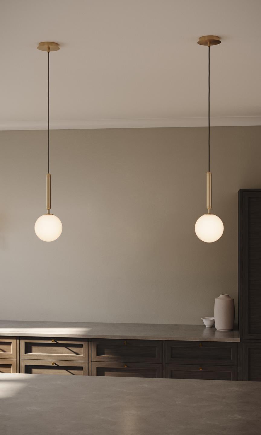 Nuura-Miira-1-Pendant-Small-Brass-Opal-Lifestyle