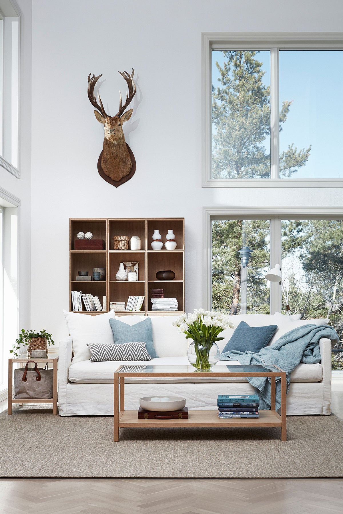 Somerville Casual Sofa 3-personers med to rygpuder og pyntepuder i turkise nuancer