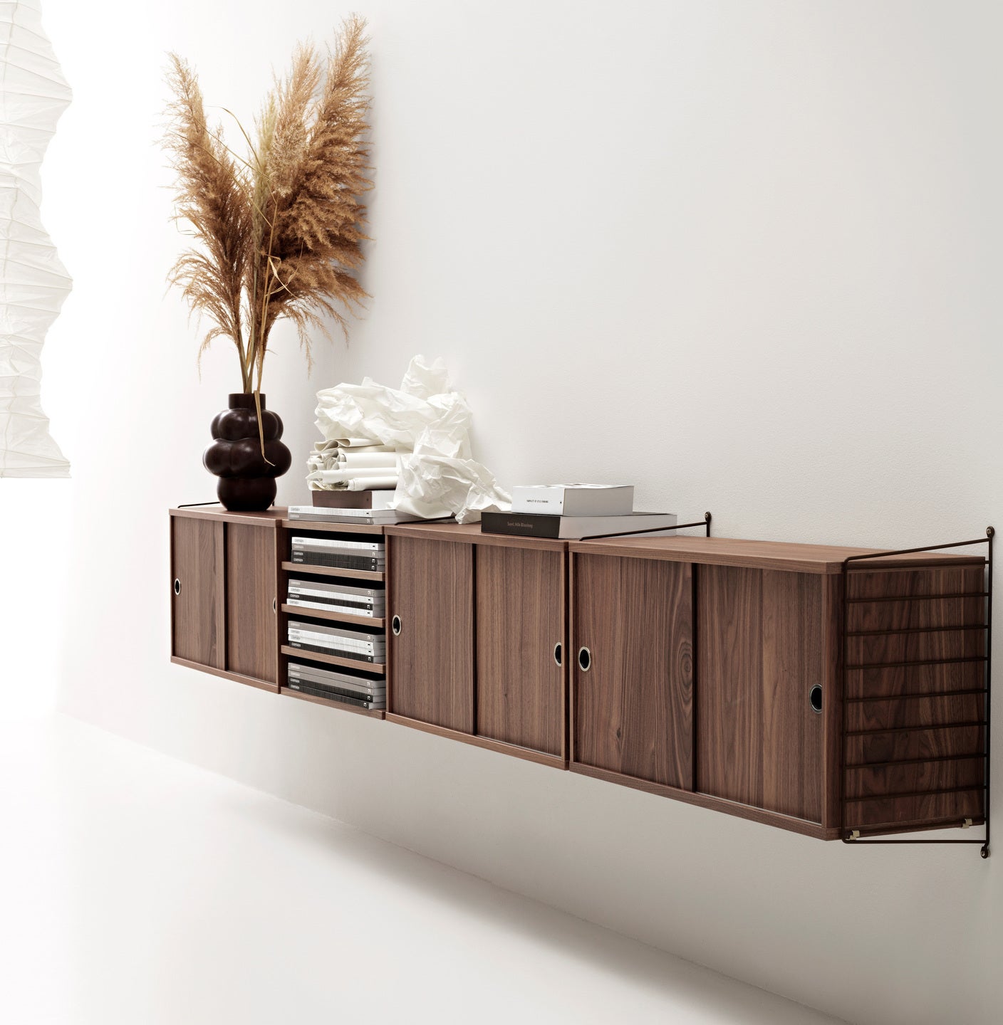 inspiration-string-system-living-room-walnut-brown-white-2_portrait_xlarge