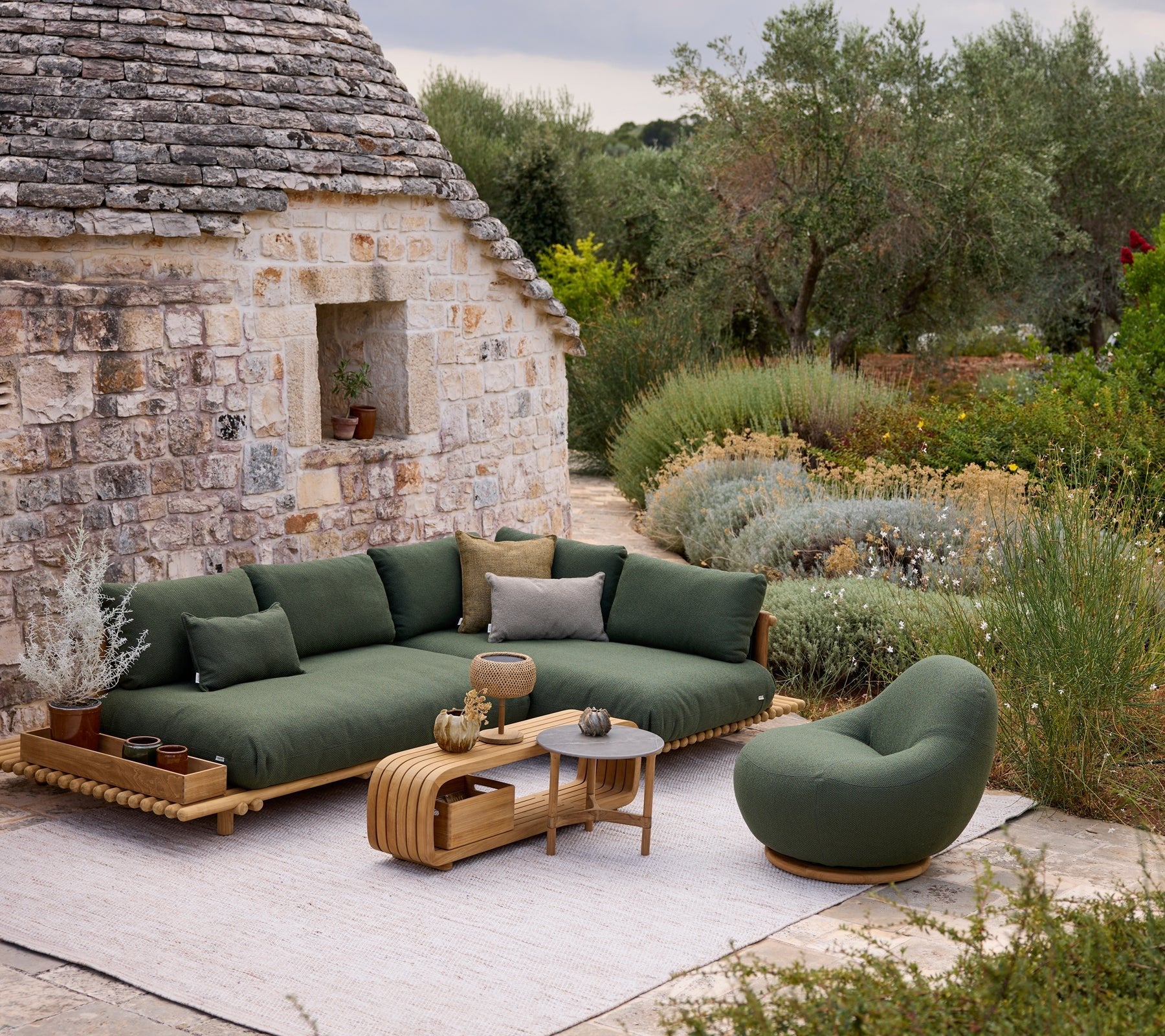 Cane-line-miljo-Sticks_platform_corner_sofa_-_Gem_lounge_chair_-_Mellow_coffee_table_7545_b8a1eeab-f27f-4676-8fa5-af4c60865893