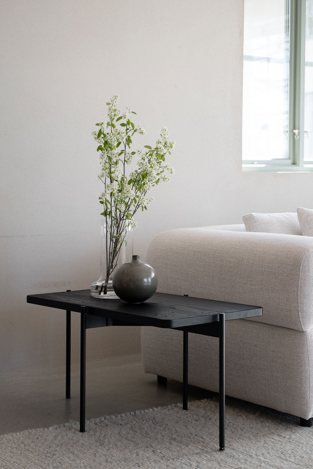 Rowico-Shelton-Coffee-Table-Black-Ash-95x50-Lifestyle