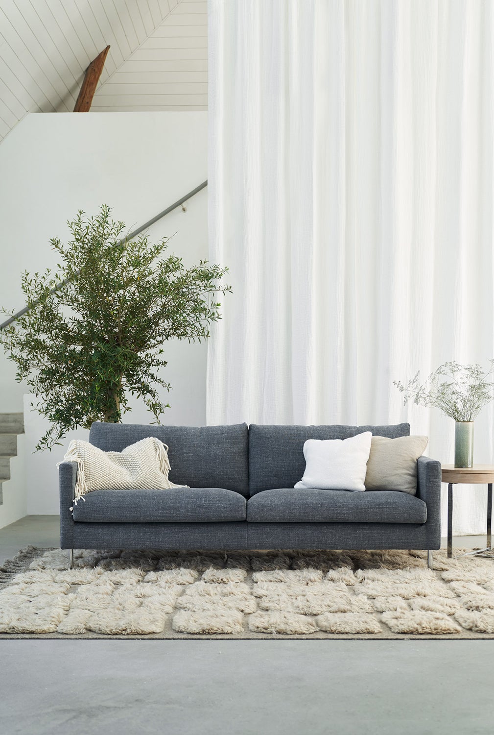 Sits Impulse 3-personers sofa Lux blågrå i stof Caleido Stampato 10 Steel i stuen.