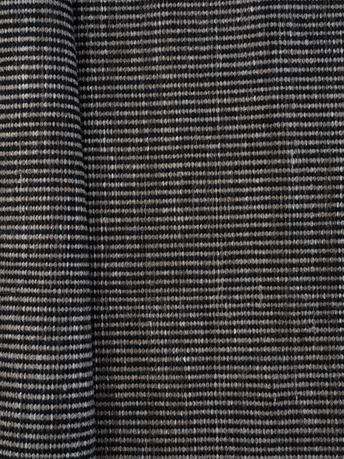 Struktur på Arbrello Tæppe i farven Black