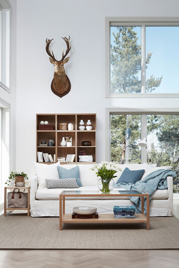 Somerville Casual Sofa 3-personers med to rygpuder og pyntepuder i turkise nuancer